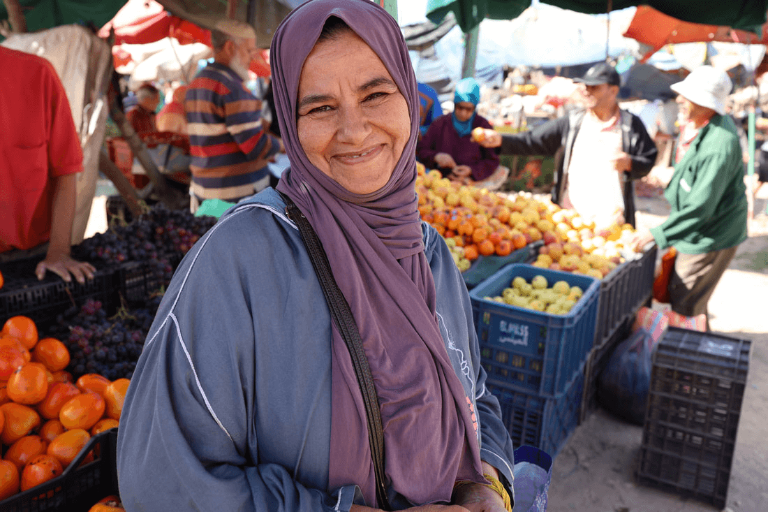 Moroccan woman in a food market in Taghazout