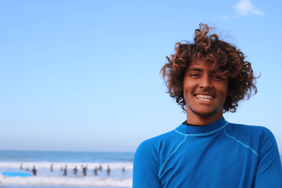 Smiling surf school instructor in Taghazout Morocco