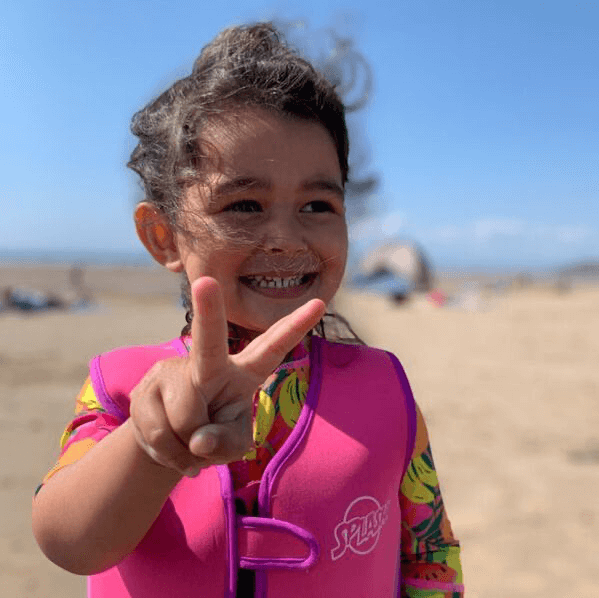 Smiling child on the beach in Taghazout Morocco