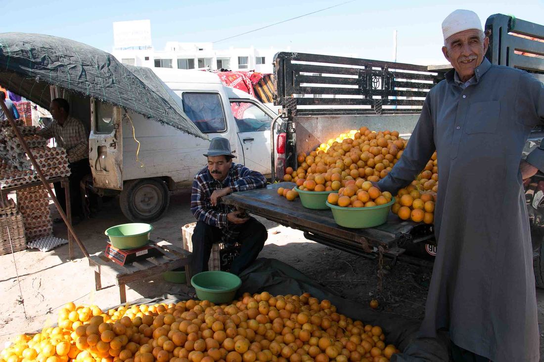 Orange sellers at Banana Village Souk